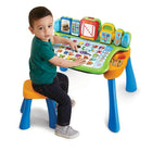 VTech Explore & Write Activity Desk - French Version-Includes a toy telephone with number pad for role-play fun.