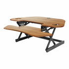 Rocelco 46" Adjustable Sit/Stand Corner Desk Riser with Anti Fatigue Mat - Teak-CADR has extra wide 46” and 24” deep work surface