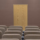 Flash Furniture Stand-Up Wood Lectern in Oak-Concealed storage area has shelf