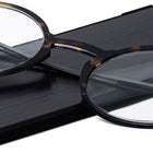 ThinOptics FrontPage Manhattan Reading Glasses - +2.50 Strength - Tortoise with Milano Black Case-Quality: We use the same lens material regularly used in high-end prescription glasses. The lenses are made by one of the most advanced optical lens manufacturers in the world.