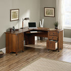 Sauder 66"W Carson Forge Corner Computer Desk - Washington Cherry-This l shaped desk fits nicely into a corner, giving you plenty of work space and storage