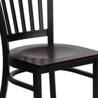 Flash Furniture HERCULES Series Black Vertical Back Metal Restaurant Chair - Mahogany Wood Seat - 2 Pack-Welded Joint Assembly