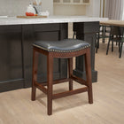 Flash Furniture 26" High Backless Cappuccino Wood Counter Height Stool with Black LeatherSoft Saddle Seat-Nailhead Trimmed Seat