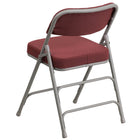 Flash Furniture HERCULES Series Premium Curved Triple Braced & Double Hinged Metal Folding Chair - Burgundy Fabric-CA117 Fire Retardant Foam