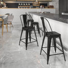 Flash Furniture 24" High Black Metal Indoor-Outdoor Counter Height Stool with Back-Black Powder Coat Finish