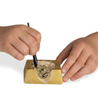 National Geographic Fool's Gold Mini Dig Kit-Gold bar-shaped dig brick contains a pyrite (fool’s gold) specimen.