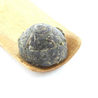 Tao Tea Leaf Rice Pu-er (Sheng) Tea - Loose Leaf - 50g-The leaves are then infused with an herbal leaf called Nuo Mi Xiang (translated  sweet rice tender leaves ), often used to for its cooling properties in the summertime