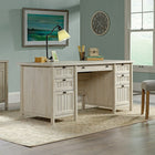Sauder 65"W Costa Executive Desk - Chalked Chestnut-Pencil drawer and four storage drawers feature metal runners and safety stops