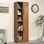 Sauder 435133 HomePlus Storage Cabinet - Sienna Oak-Adjustable base levelers for alignment on uneven flooring.