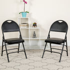 Flash Furniture HERCULES Series Ultra-Premium Triple Braced Black Vinyl Metal Folding Chair with Easy-Carry Handle-Riveted Steel Components