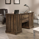 Sauder 59"W Barrister Lane Executive Desk - Iron Oak-Adjustable shelf behind door