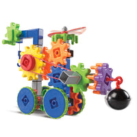 Learning Resources - Engrenages ! Engrenages ! Engrenages ! Machines en mouvement-Les enfants testent leurs compétences en ingénierie et en conception avec ce bâtiment ouvert sur le thème des véhicules et des machines