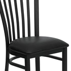 Flash Furniture HERCULES Series Black School House Back Metal Restaurant Chair - Black Vinyl Seat - 2 Pack-Welded Joint Assembly