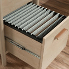 Sauder 94"W Whitaker Point L-Desk - Natural Maple-   Adjustable shelf behind door to accommodate items of various heights