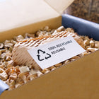 Reliabag Honeycomb Cushion Wrap Packing Paper with Fragile Stickers - 15" x 165'-Flat on the roll and expands when in use to have 80% less storage space compared to traditional plastic cushion wrap