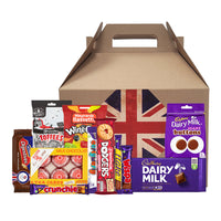 Dolce & Gourmando British Gift Basket-Kit contains Wispa, Crunchie bar, Jamie Dodgers, Curly Wurly, Flake bar, Cadbury Buttons, Cadbury Dairy Milk Bar, Walkers Licorice Toffee, McVities Digestives, Tannock’s Teacakes, and Wine Gums