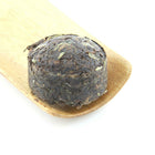 Tao Tea Leaf Rice Pu-er (Shou) Tea - Loose Leaf - 50g-The dry leaves are individually wrapped miniature pu-er cakes. Once opened the leaves are highly compressed mixes of green, black, brown and copper colour