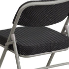 Flash Furniture HERCULES Series Premium Curved Triple Braced & Double-Hinged Black Pin-Dot Fabric Metal Folding Chair-Double-Hinged