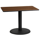 Flash Furniture 24'' x 42'' Rectangular Walnut Laminate Table Top with 24'' Round Table Height Base, Black (XUWA2442TR24)-Hospitality Table