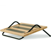 Humanscale Tilting Foot Rest-Provides uncompromising foot support that also encourages healthy circulation while the user is seated