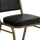 Flash Furniture HERCULES Series Trapezoidal Back Stacking Banquet Chairs with Black Vinyl & Gold Frame - 4 Pack-Upholstered Back and Seat
